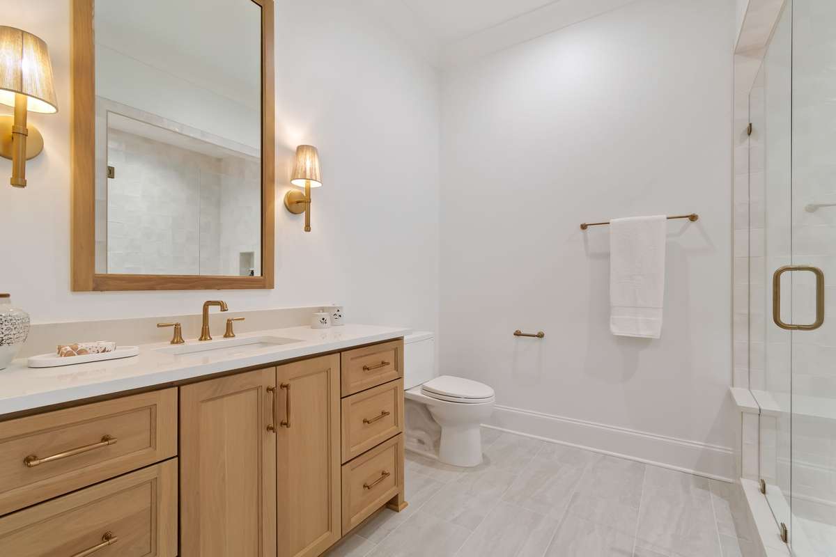 Each upstairs bedroom is complete with its own bathroom and walk-in closet