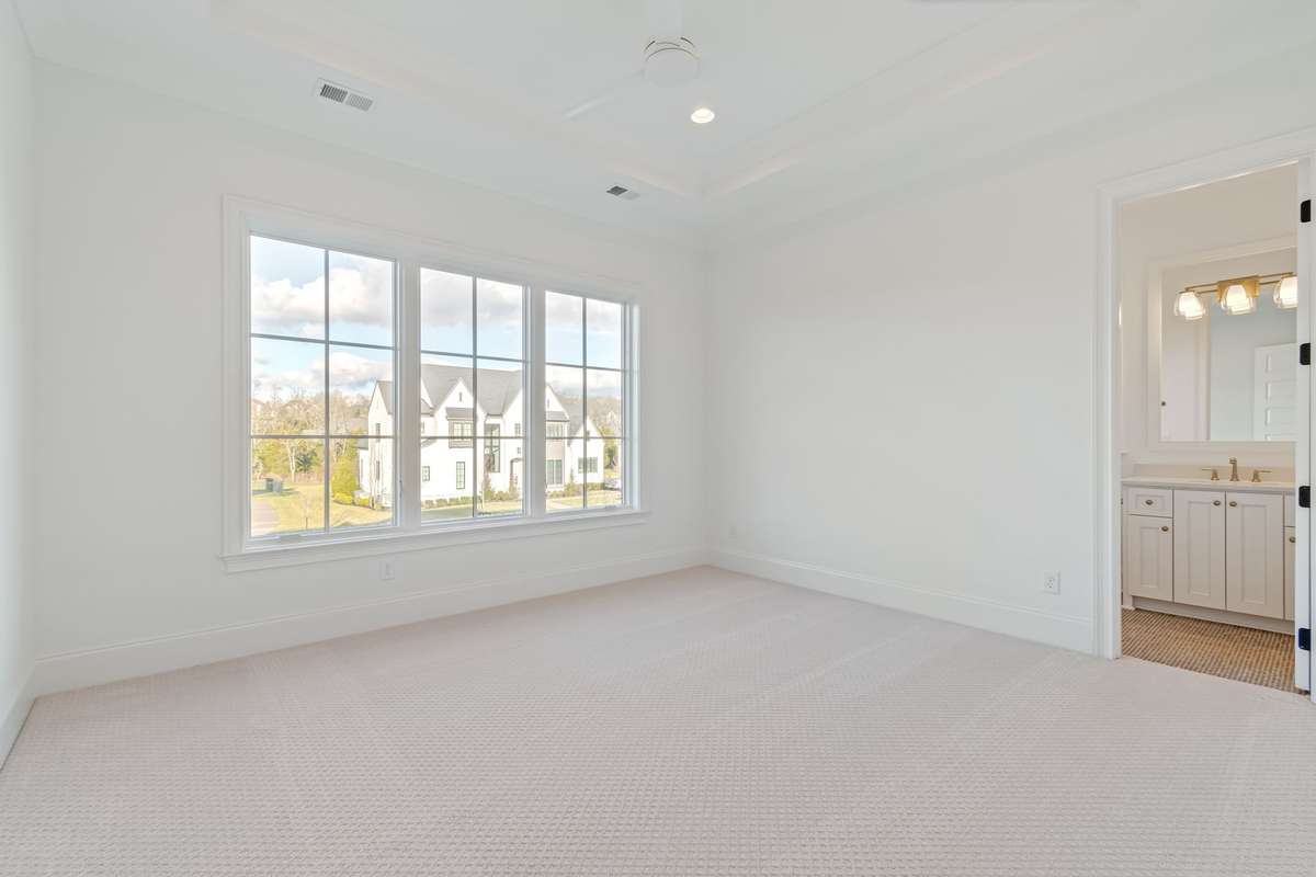 One of three bedrooms on the upper level