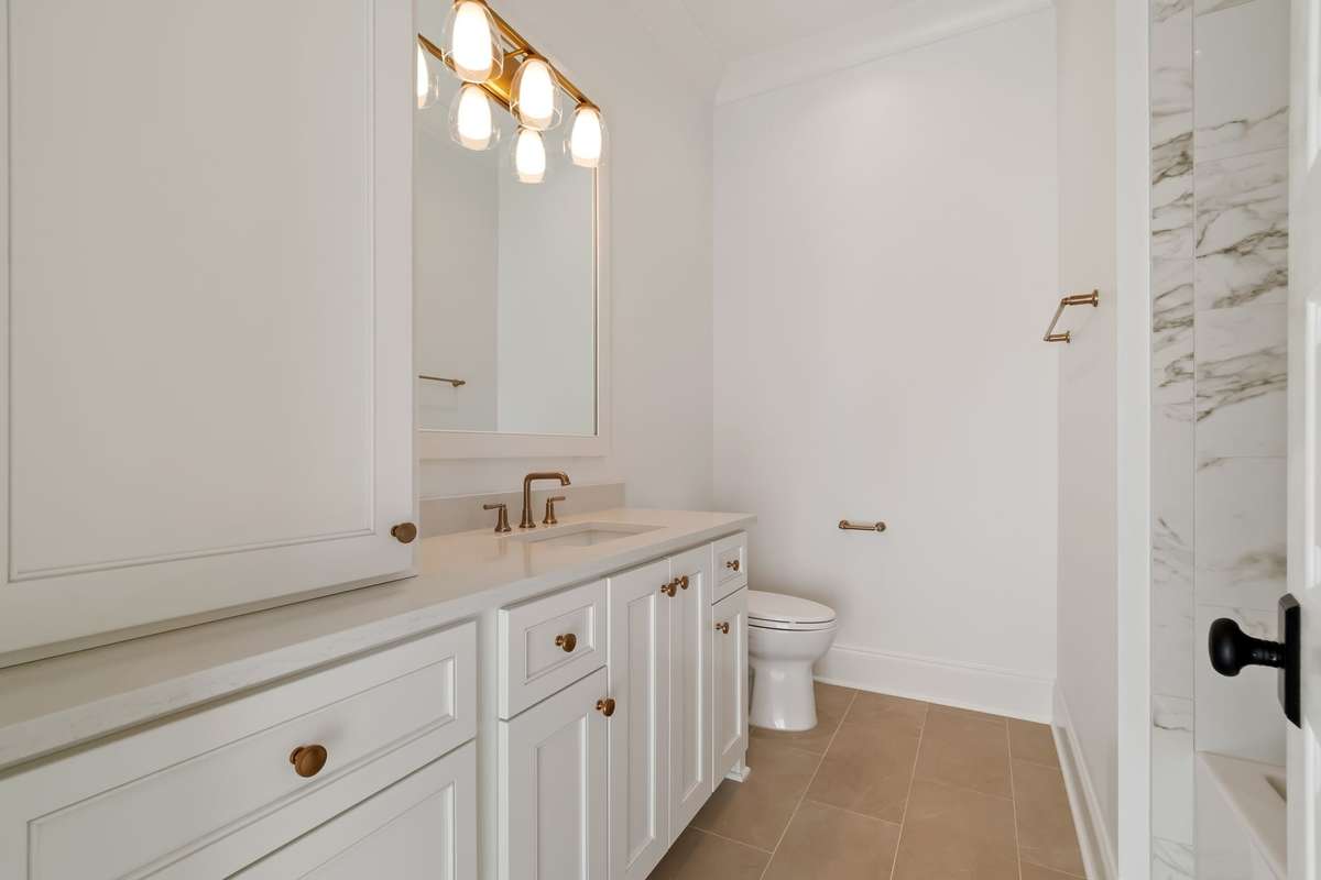 Each upstairs bedroom is complete with its own bathroom and walk-in closet