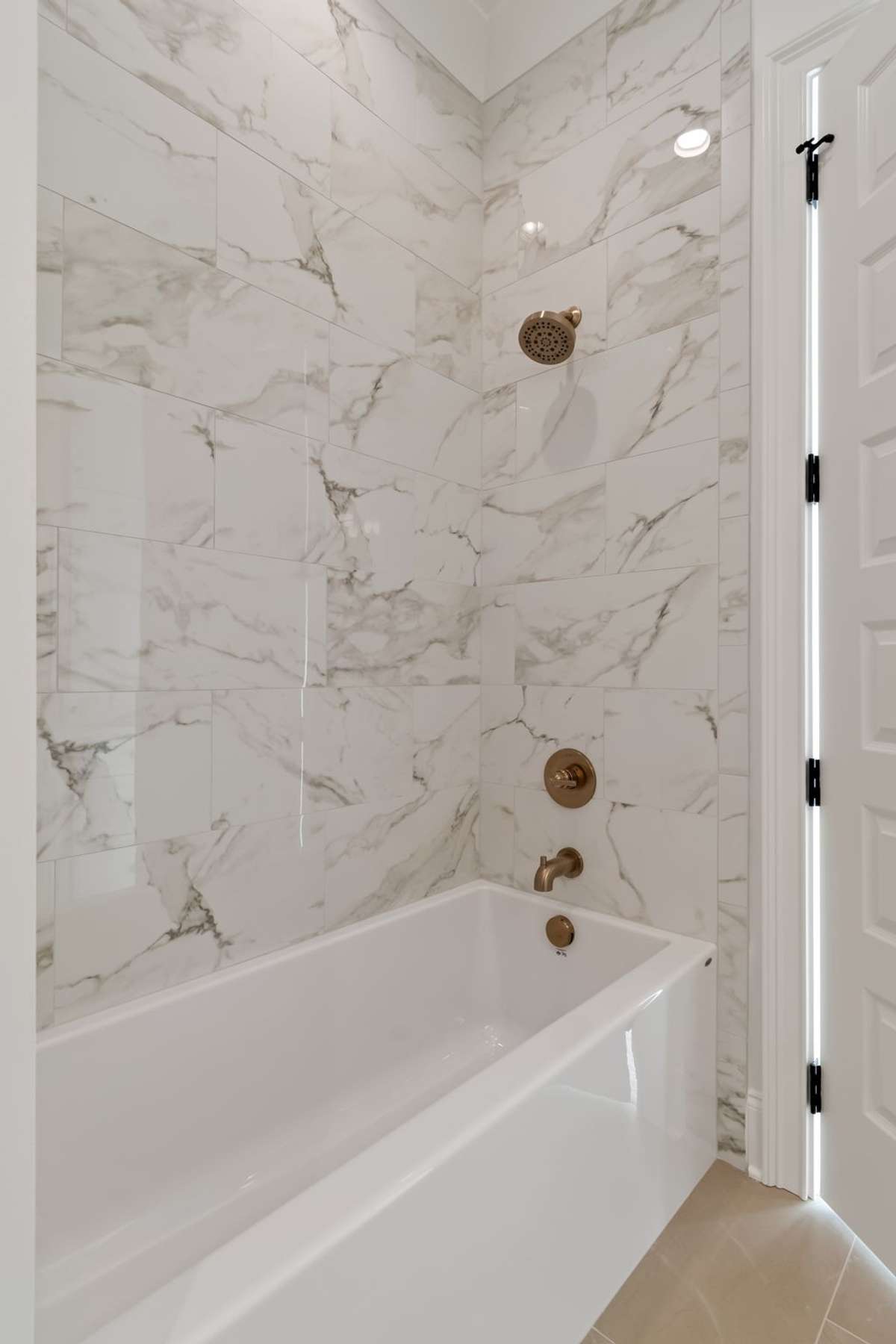 Each upstairs bedroom is complete with its own bathroom and walk-in closet