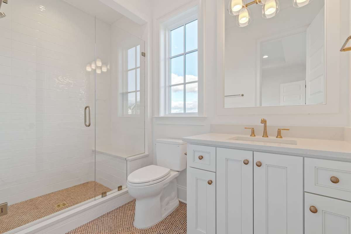 Each upstairs bedroom is complete with its own bathroom and walk-in closet