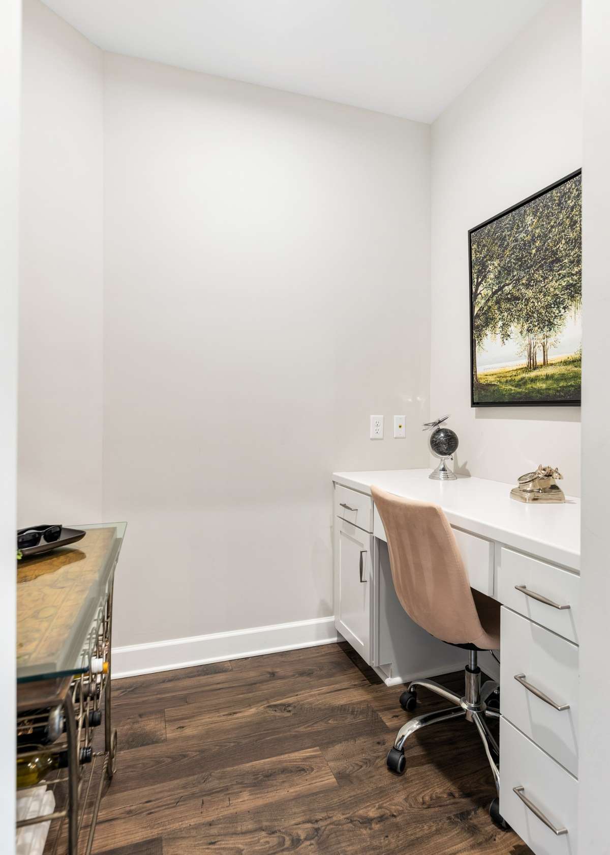 One of the builder upgrades in this unit offers a permanent office space with built-in desk.