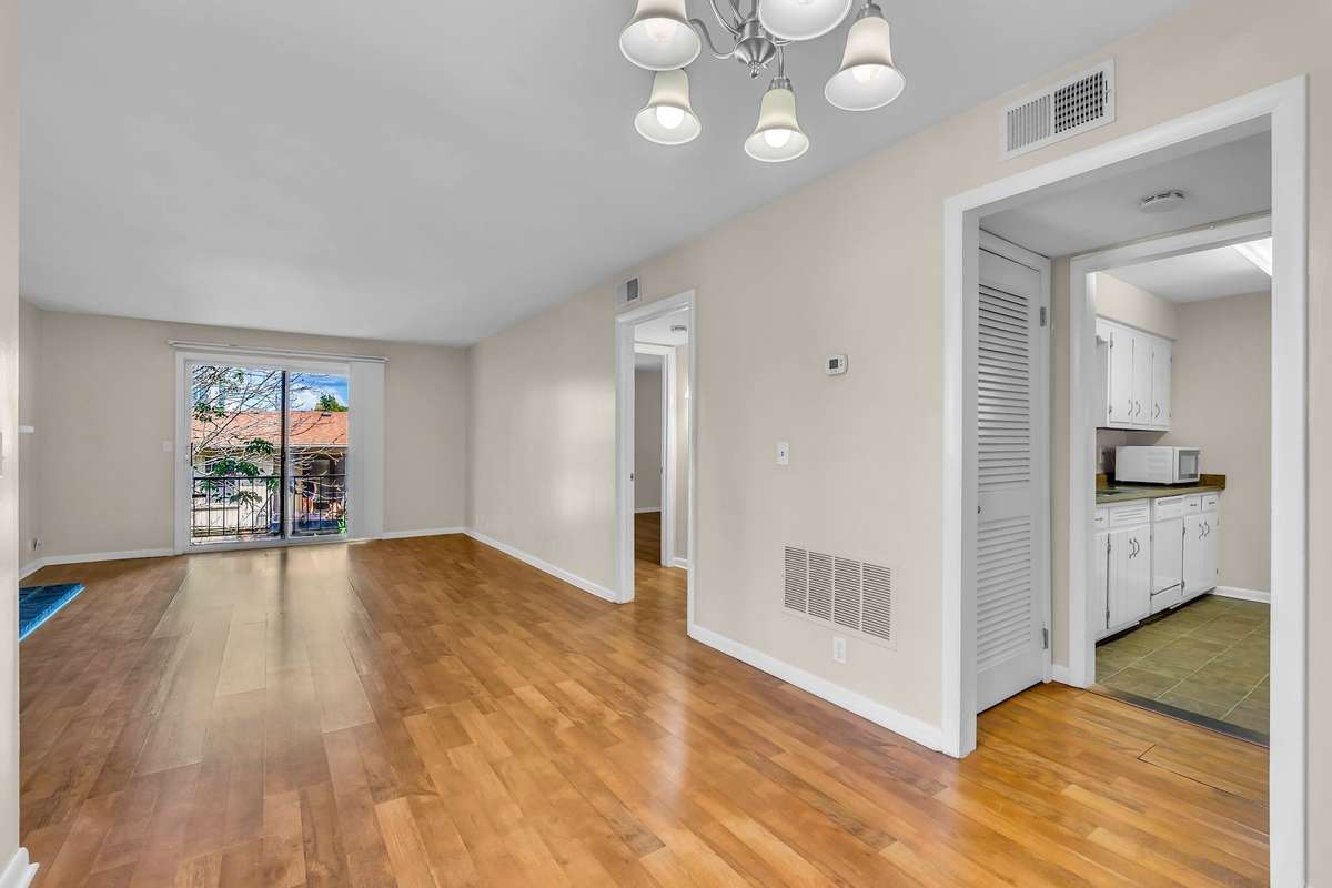 The dining area is adjacent to the kitchen.