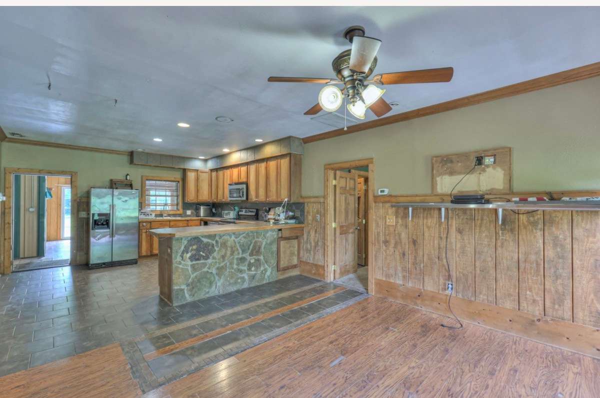 Den looking into kitchen