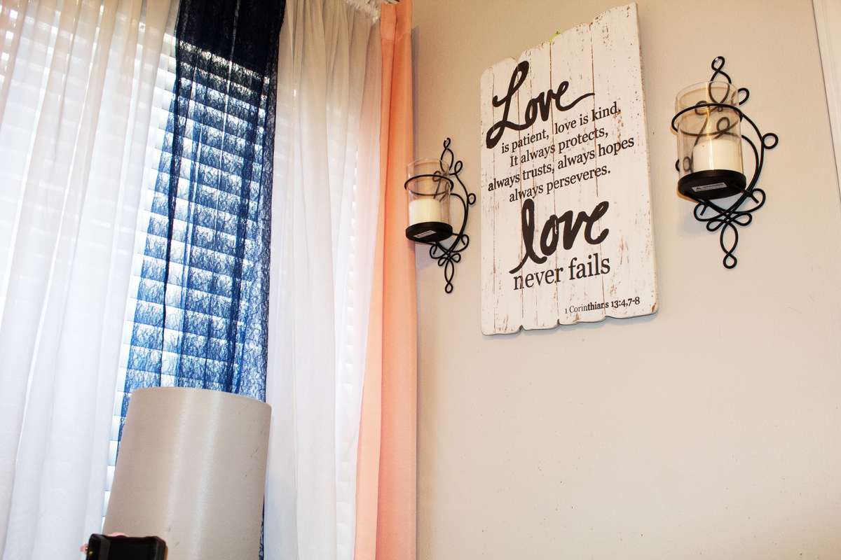 Part of the first bedroom on the left