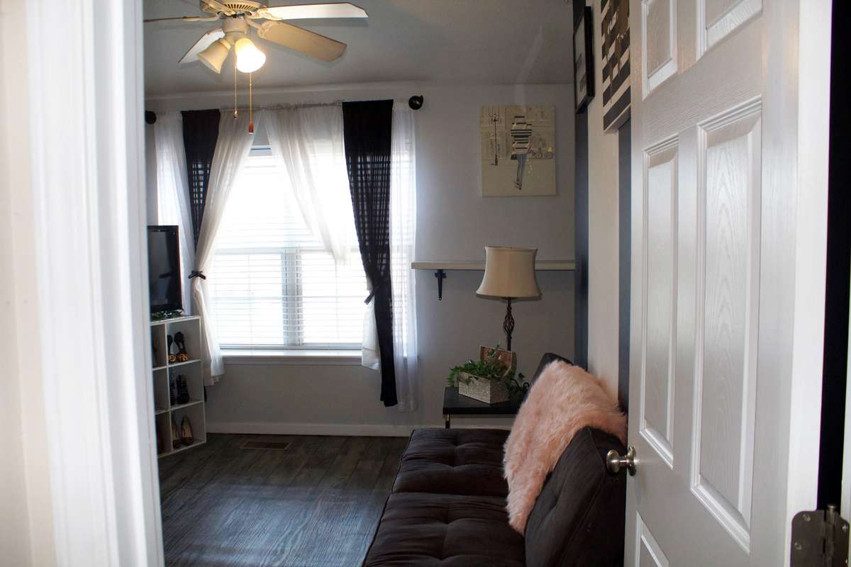 Upstairs bedroom to the right with full bath and extra large walk in closet.