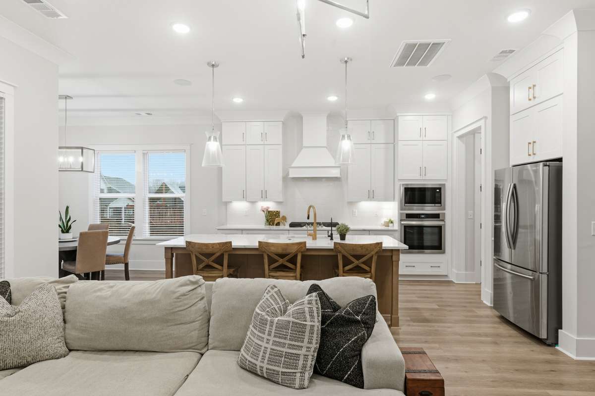 High ceilings, updated fixtures, and loads of natural light adorn the main living spaces.