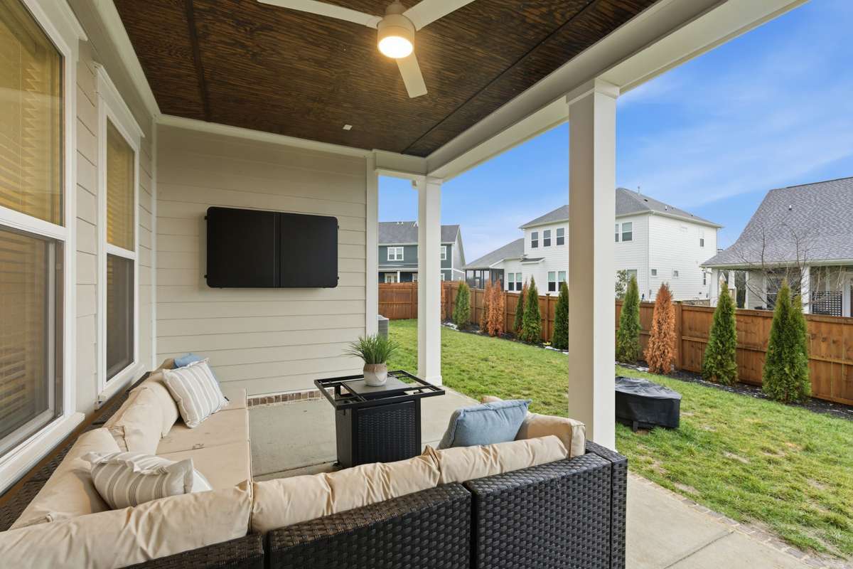 Outside, the home offers an exterior oasis that will have you yearning to be outside with your friends and family. Complete with an overhead fan, lighting, and concrete pad, you will love this outdoor space.