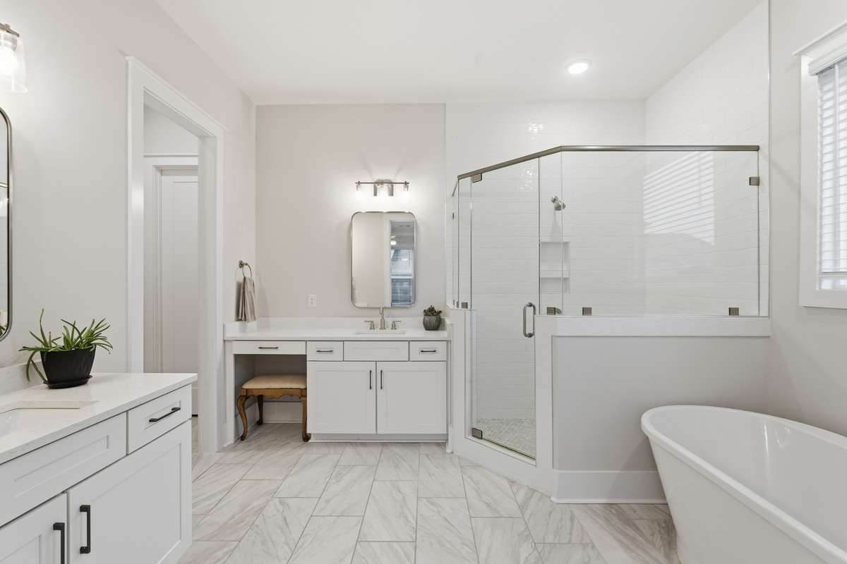 Imagine getting ready for the day in this oasis. This 5-star primary bathroom will make you feel like you are at a boutique hotel with all its amenities. Enjoy your own space with the double countertop and built in make-up vanity.