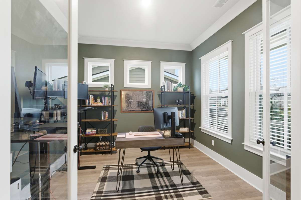 Large and inviting double doors welcome you to your new office space. Large windows and crisp crown molding add sophistication to the space.