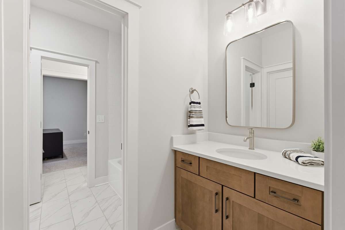 Modern mirrors, updated fixtures, and large spaces create an oasis for everyone!