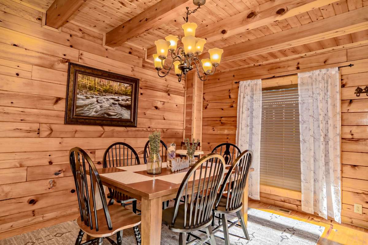 Family gathering table...The dining area is an open concept to the living space & the table seats 6