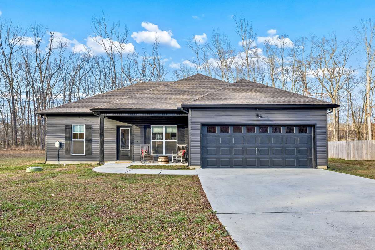 Front Driveway with room to park for 4 additional vehicles not including the garage