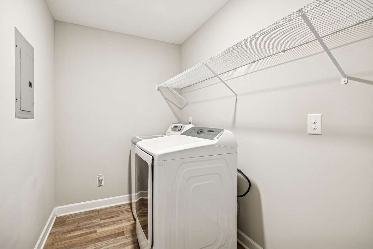 very large laundry room with room for storage