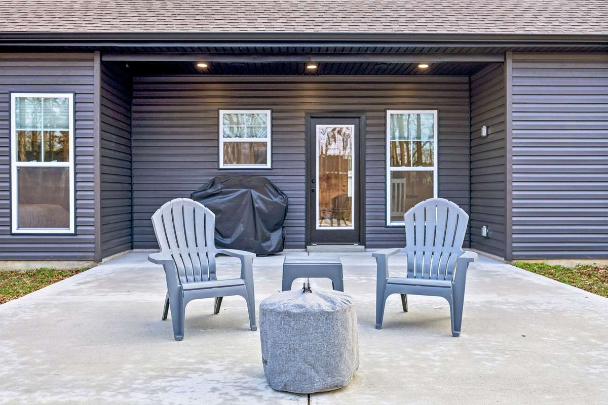 Back porch with integrated Bluetooth speakers for entertaining.