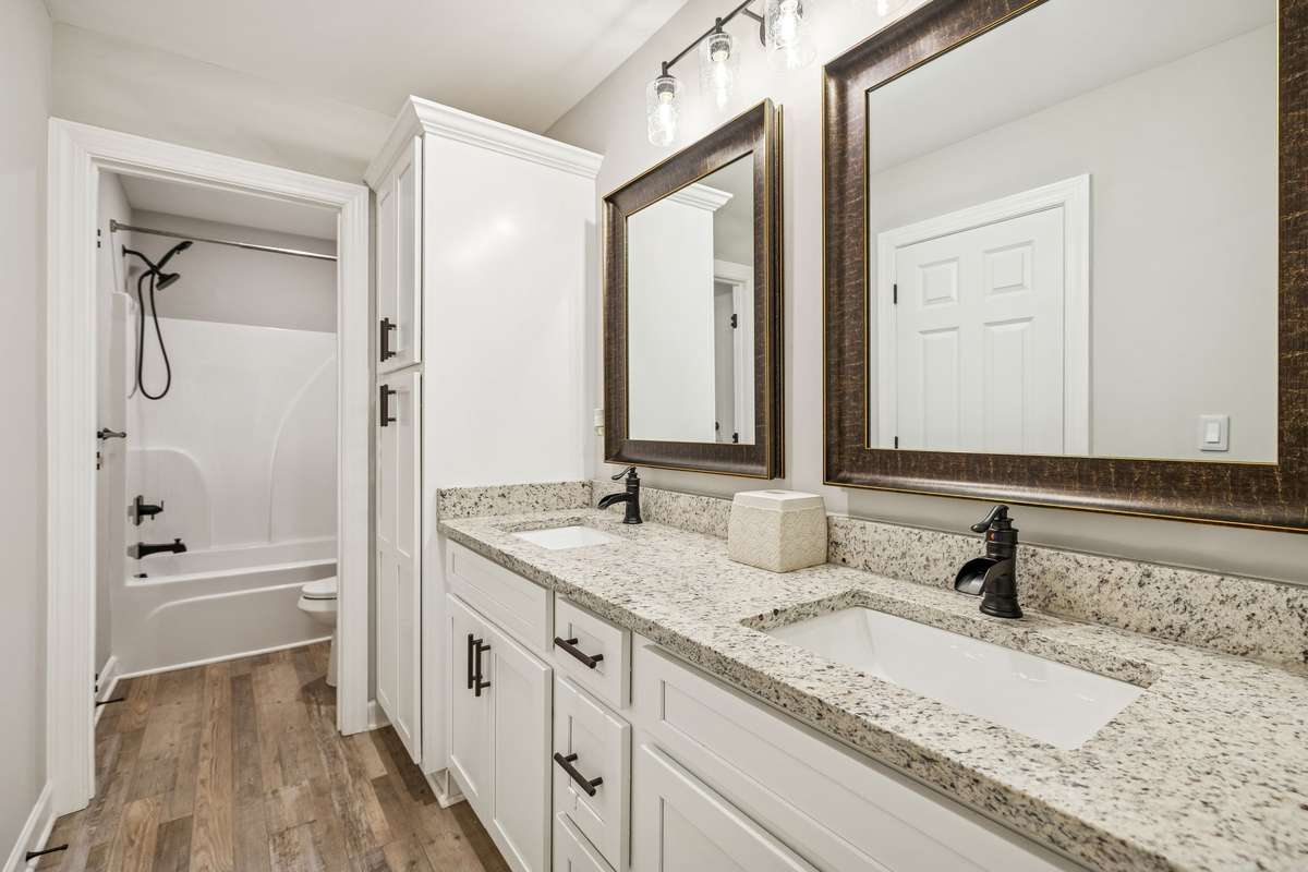 Primary Bathroom with double vanities