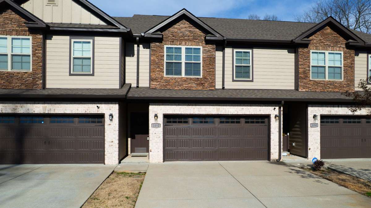 Two car garage and generous driveway.
