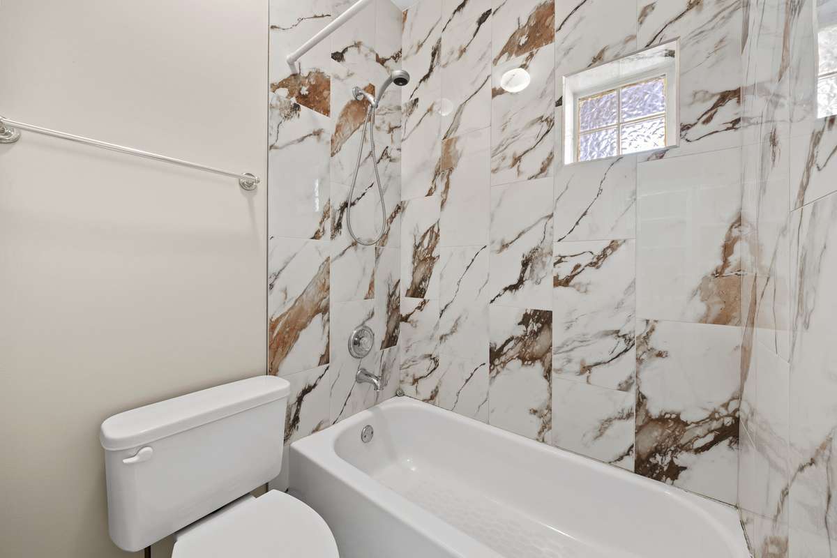 New tile in downstairs suite bathroom