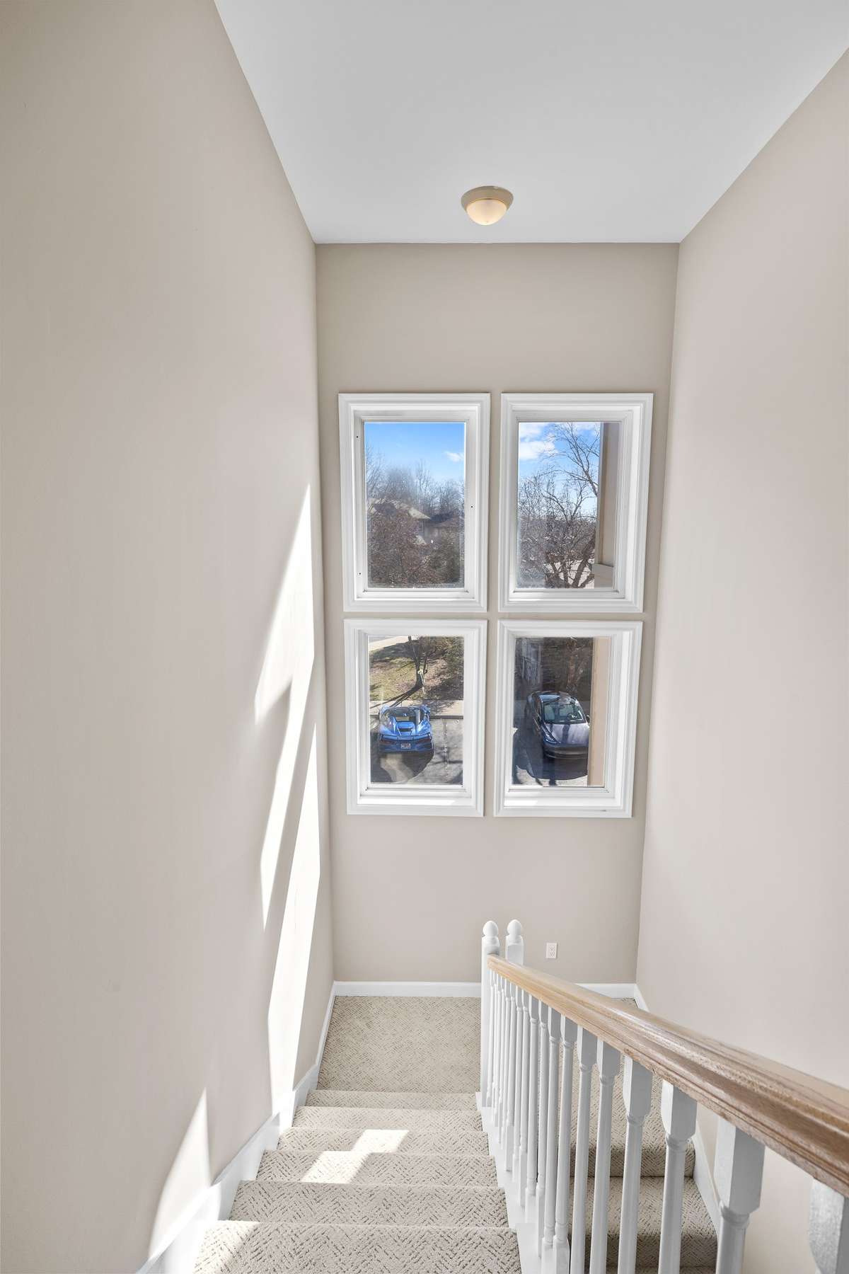 Natural light leading up to the top floor owner's suite