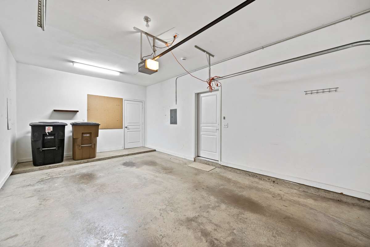 Attached garage for your additional private parking and storage needs.