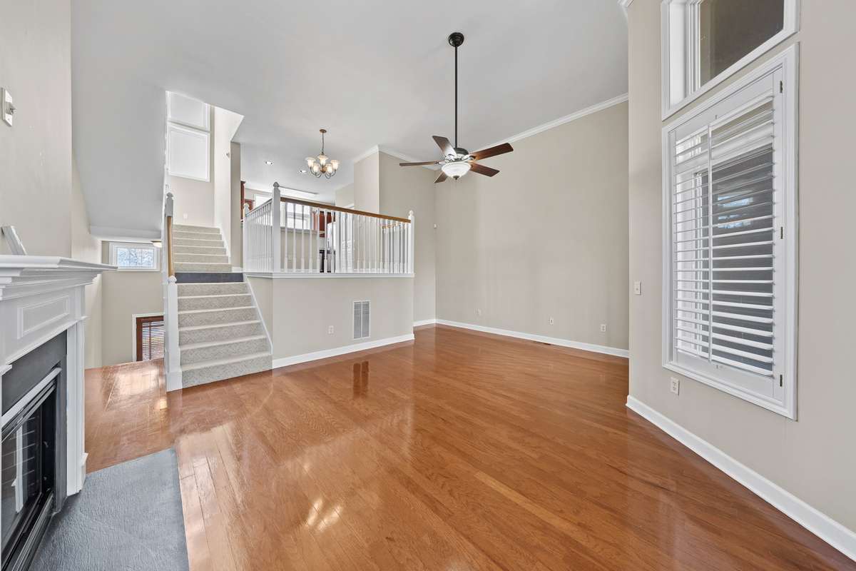 High ceilings, open concept, and steps leading up to the top floor owner's suite.