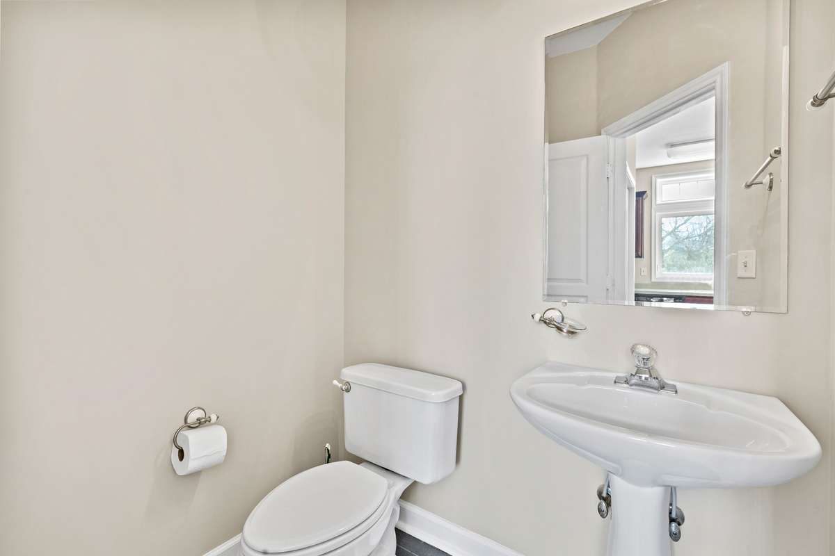 Guest Bathroom on the middle level. There are bathrooms on each floor.