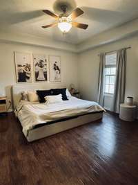 Spacious Owner's suite with trey ceiling, walk in closet and full bath