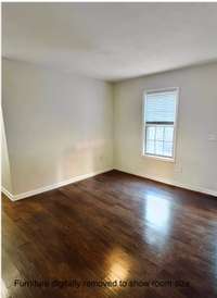 Furniture digitally removed to show the size of this space.