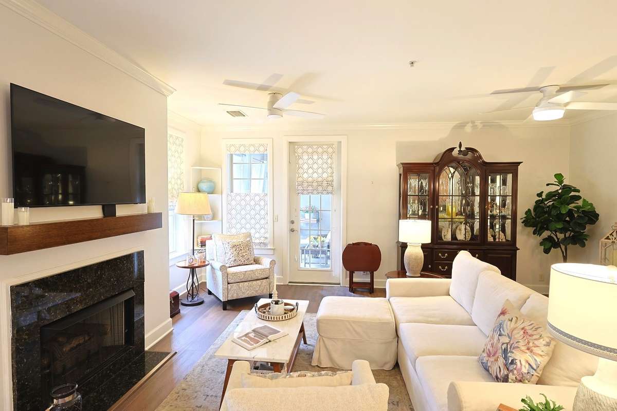 This special unit was updated in 2024 with gleaming hardwood floors, upgraded appliances and lighting fixtures, paint, window treatments and more -- the whole package!