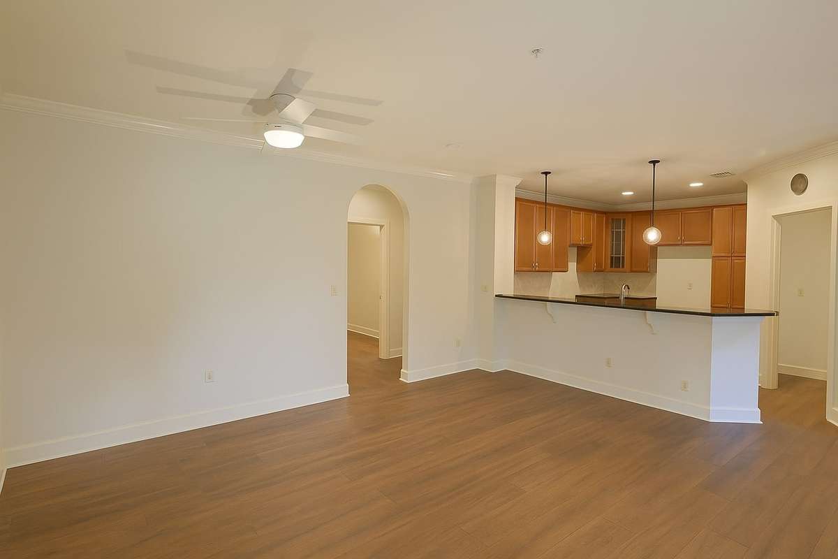 Photo has been altered with AI to show room with no furnishings.