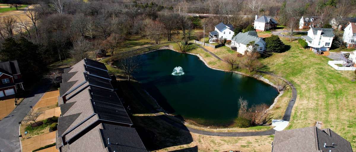 This sweet community includes a walking trail around it's own pond with serene fountain.  And it's just steps away from the townhome