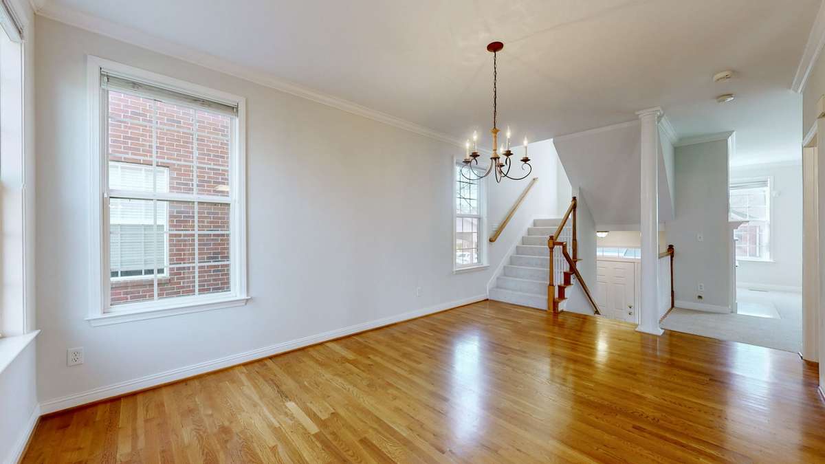 The dedicate dining room is very spacious.  To the right you can see into the light filled living room