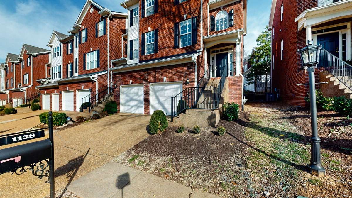 This lovely home is an end unit that comes with a two car garage