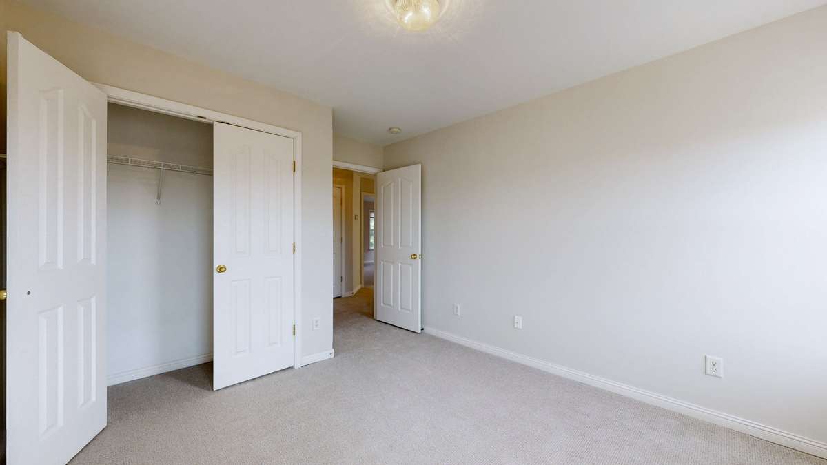 The second guest bedroom looking back towards the entry