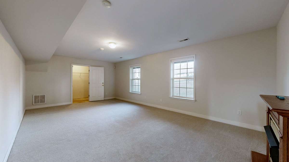 On the basement level right off the garage you will find a lovely bonus room.  The doorway goes into a large storage area.  You can't have too much storage.