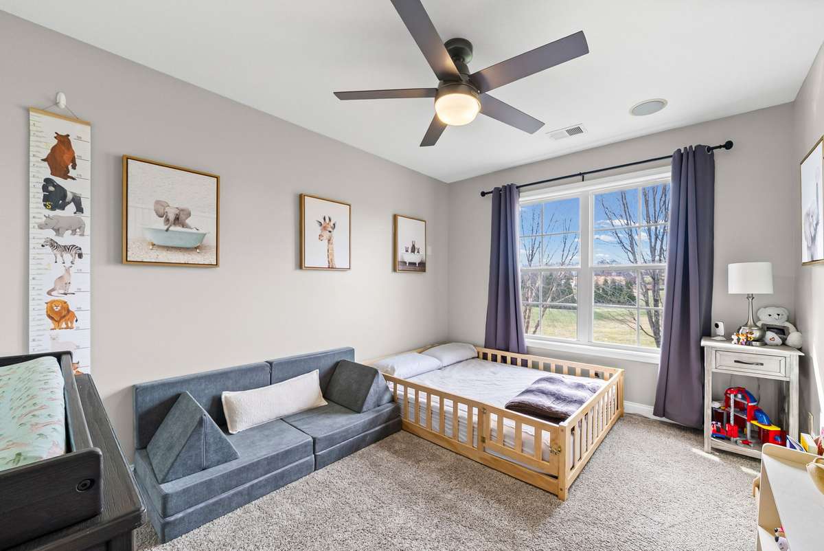 Have you noticed that every room has full length windows which is extremely rare for beautiful lighting, and that's exactly what this lovely bedroom offers.