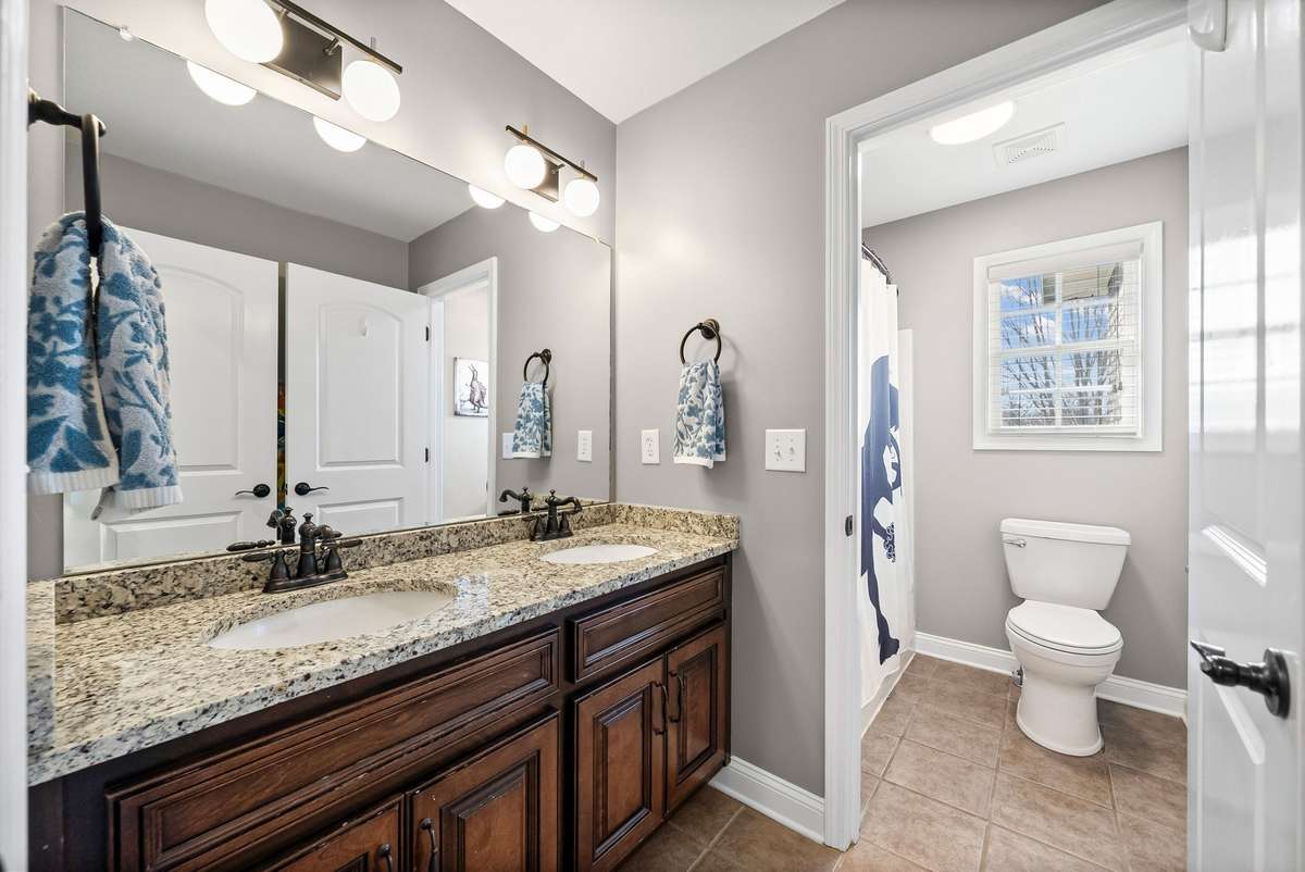 This hall bathroom is perfectly located upstairs between the additional bedrooms and right next door to the fabulous Bonus Room.
