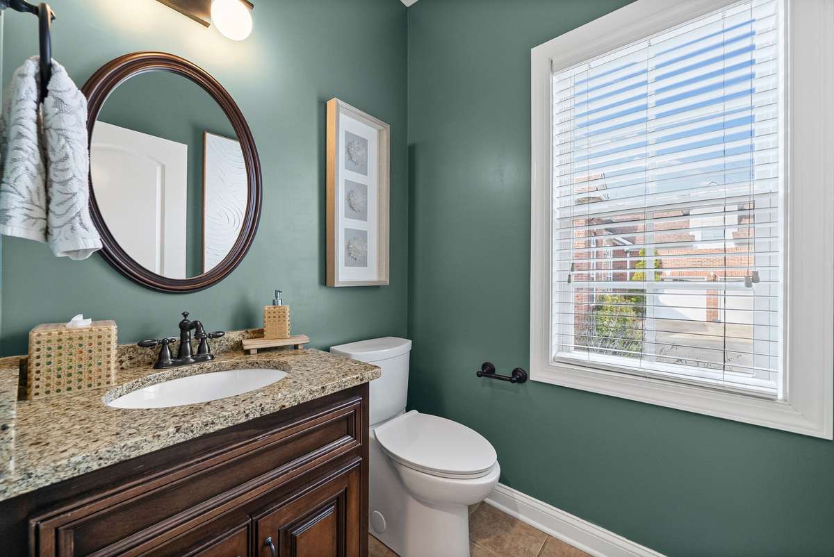 This lovely powder bath is located on the main floor next to your gorgeous formal dining room and amazing office, making a perfect convenience for your family and guests. l