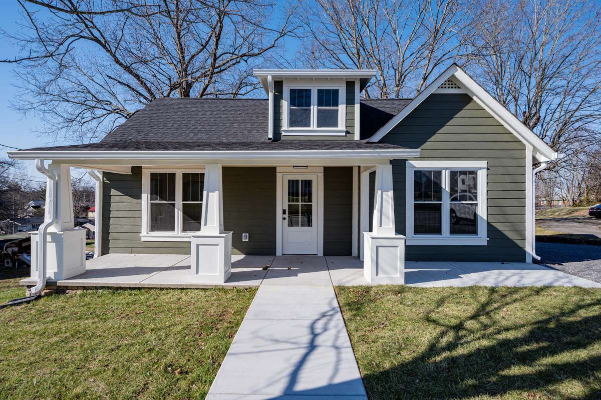 Beautiful craftsman style home w/ custom built pillars, rocking chair front porch and hardy board construction.