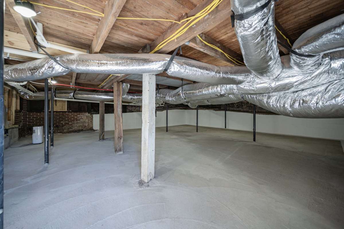 Extra storage under the house. One de humidifier will remain. Area also has extra electric box wired for any future storage building or garage that needs power.