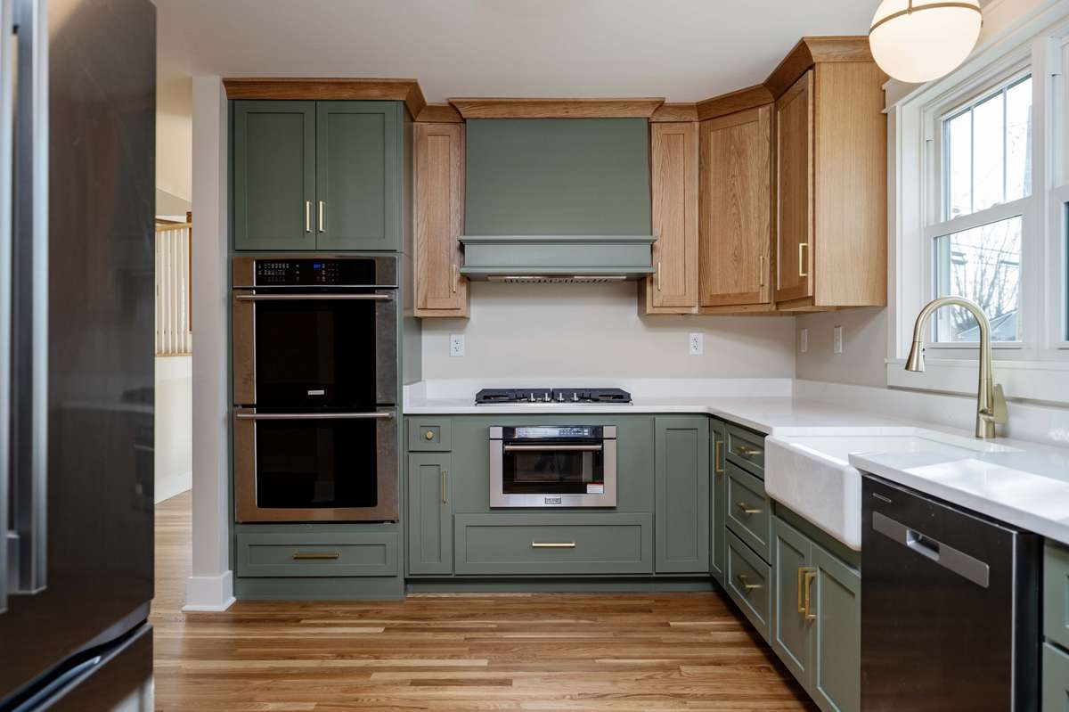 Stainless refrigerator, gas cooktop and z line built in microwave.0