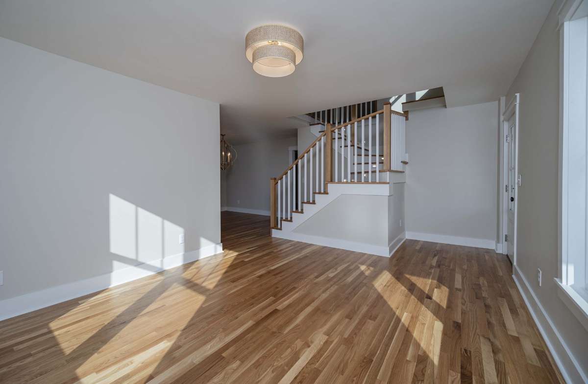 This room provides abundant natural light that greets you as open the front door.