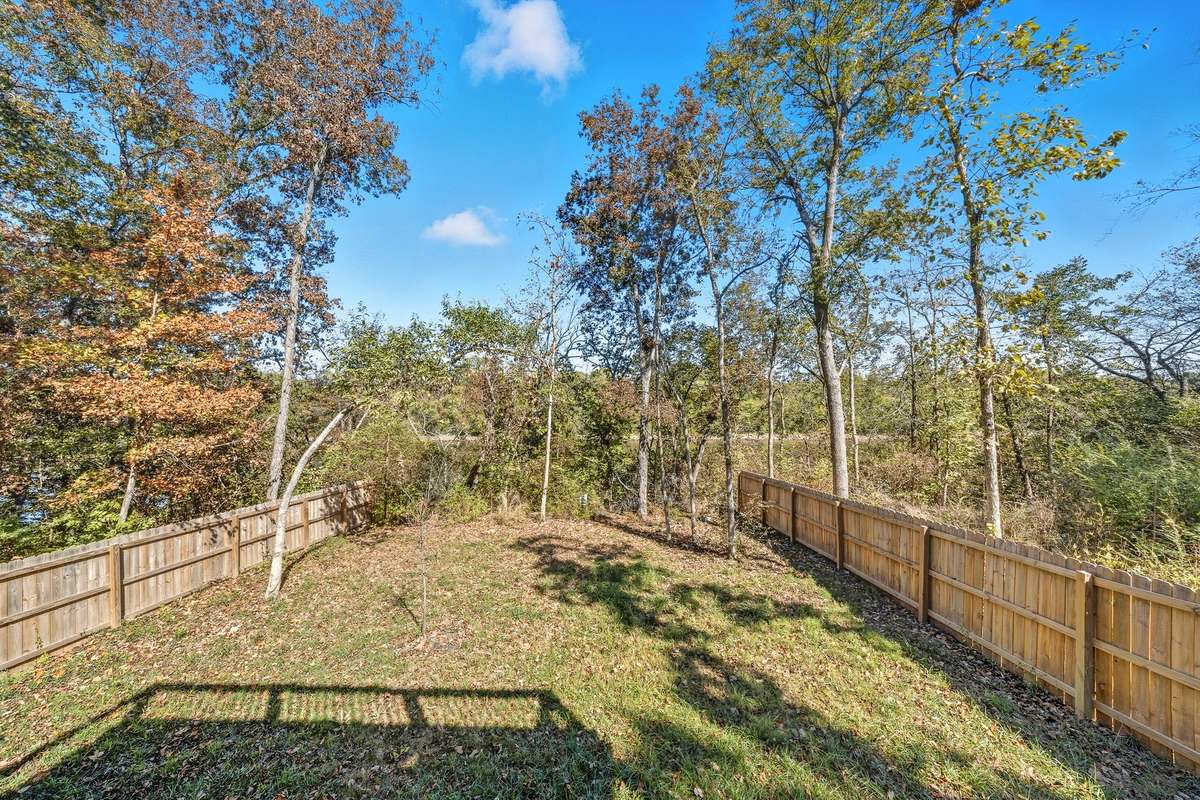 Beautiful fall view of the tree line that can easily be cleared of brush for a year round river view.