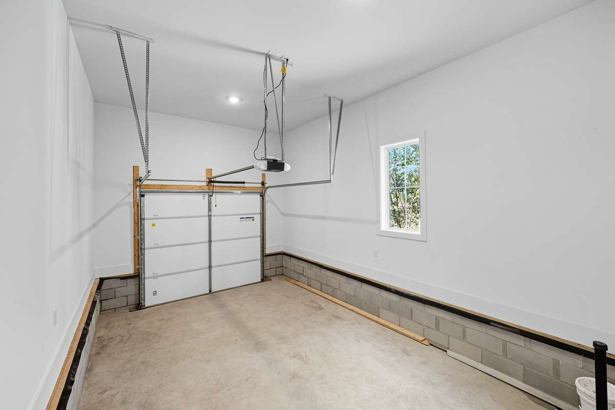 Fully enclosed and completed garage space.