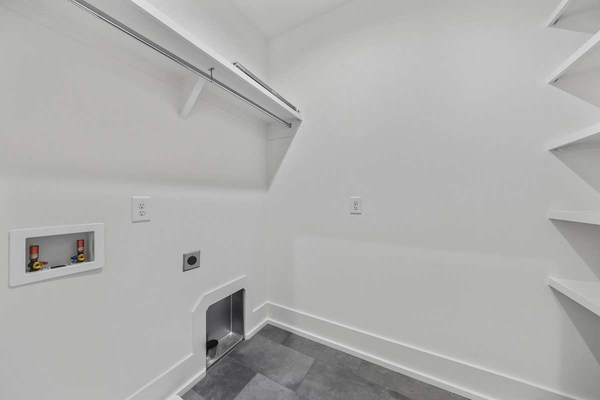 Laundry Room on 2nd Level making it convenient.  Plenty of storage space for your cleaning supplies or extra bedding