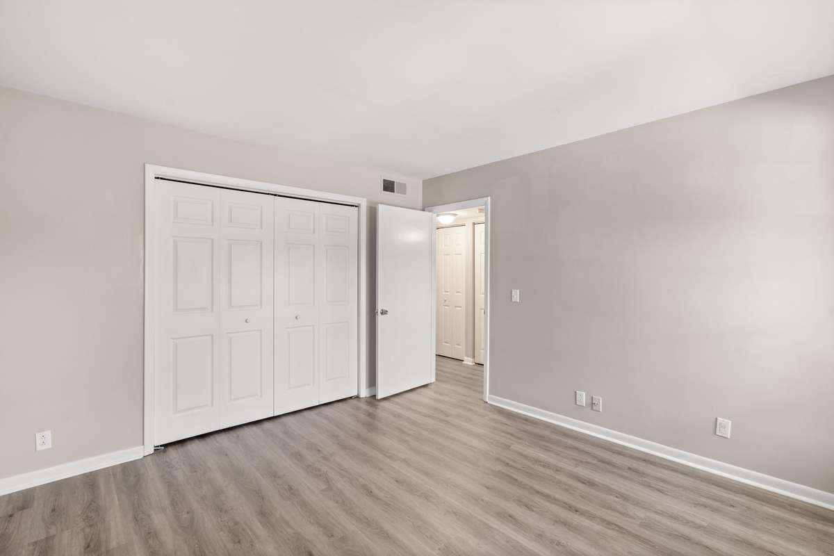 The second Bedroom also includes fresh paint, luxury vinyl plank flooring, lots of natural light, an extra large closet, and a charming window seat with storage. The second full Bathroom is located just beside the Bedroom.
