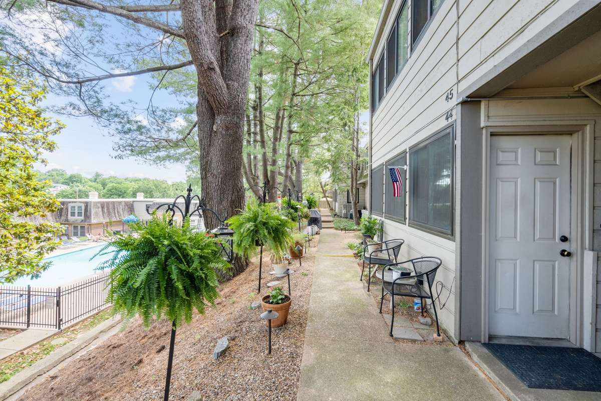 Versailles community offers lots of sidewalks and walkways surrounded by well-maintained grounds and plenty of mature shade trees.