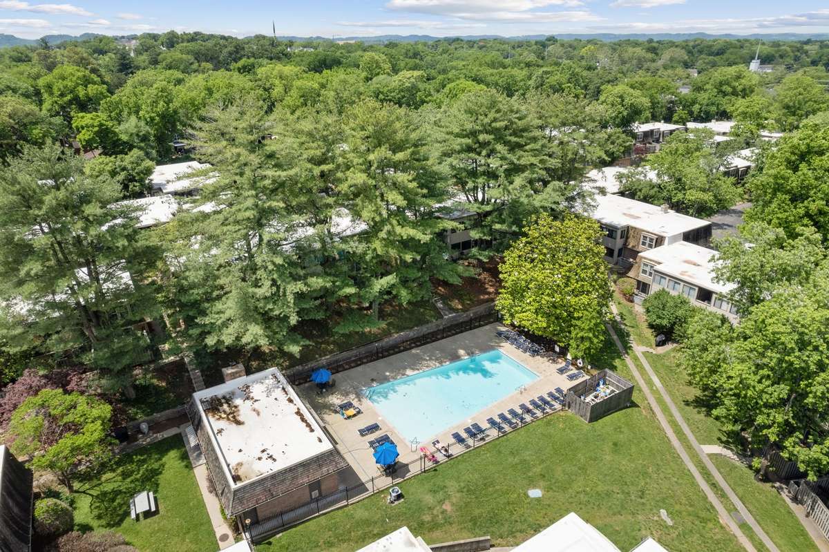 Versailles' peaceful and pristine community pool and clubhouse is conveniently located just behind Unit 45.
