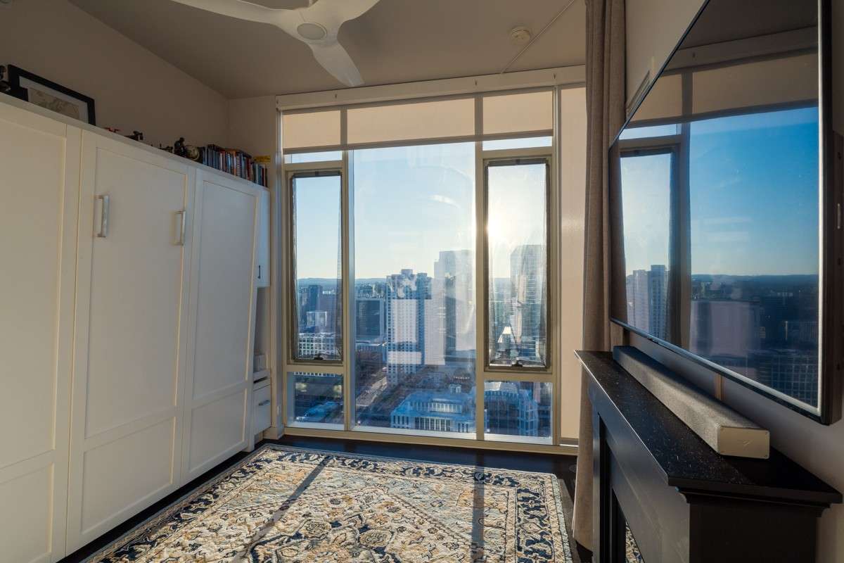 Simply lift the Murphy bed up by day to enjoy an open, flexible layout!