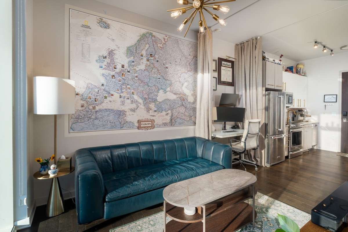 Designed for comfort and versatility, the space flows seamlessly from kitchen to lounge, creating an inviting atmosphere high above the energy of the city!